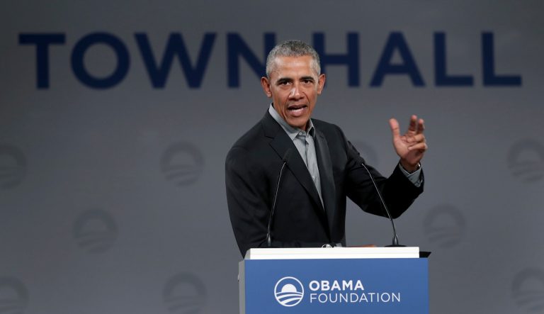 Former US President Barack Obama gestures as he speaks during a town hall meeting at the 'European School For Management And Technology' (ESMT) in Berlin, Germany, Saturday, April 6, 2019. 