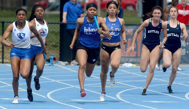 Indiana State's Faith Lindsey, center, takes off with her relay teams baton during the women's 4x100-meter relay during the Gibson Invitational on Saturday, April 6, 2019 in Terre Haute, Ind.