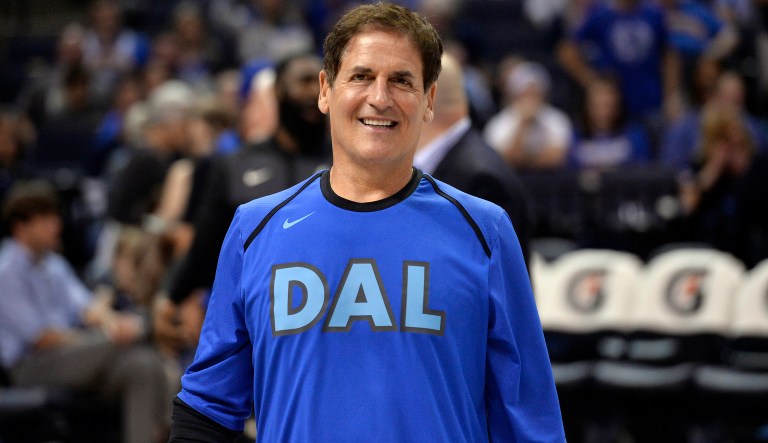 Dallas Mavericks owner Mark Cuban stands on the court in the first half an NBA basketball game between the Mavericks and the Memphis Grizzlies Sunday, April 7, 2019, in Memphis, Tenn.