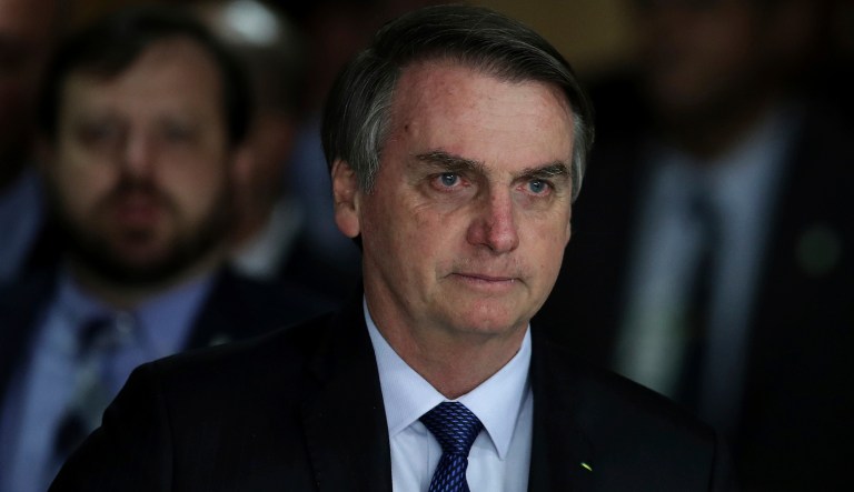 Brazil's President Jair Bolsonaro arrives for a meeting, at the Planalto Presidential Palace in Brasilia, Brazil, Monday, April 8, 2019.