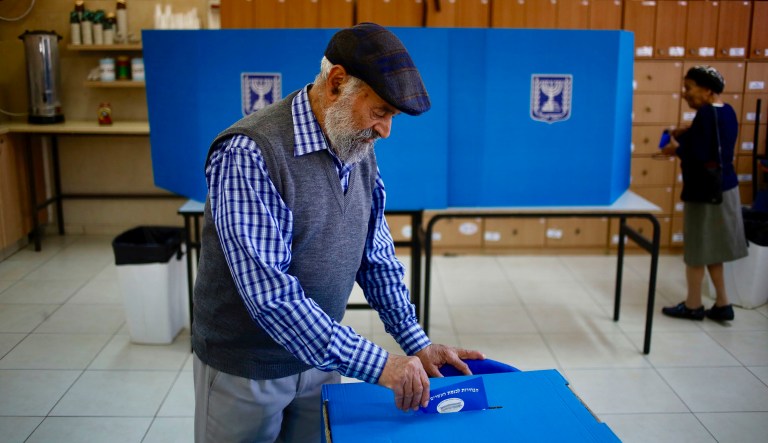 People vote during Israel's parliamentary election at a polling station in the West Bank settlement of Efrat, Tuesday, April 9, 2019. 