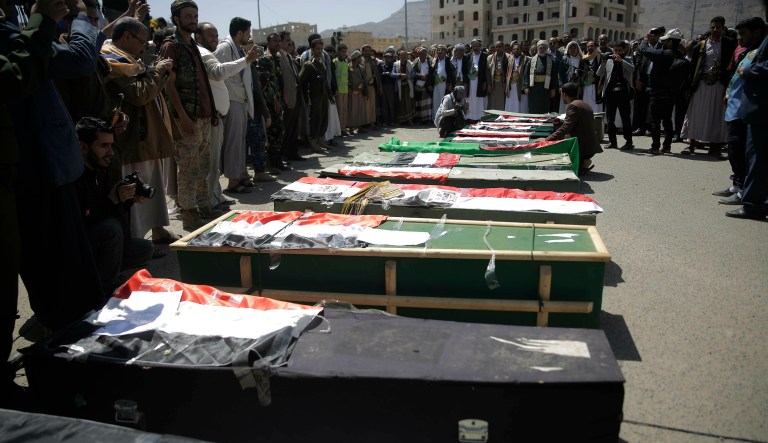 Mourners attend a mass funeral of victims of an explosion during a funeral procession in Sanaa, Yemen, Wednesday, April 10, 2019. Residents of the Yemeni capital recounted on Monday the horror of a large explosion a day earlier that killed more than a dozen civilians, including seven children, and wounded more than 100 â the cause of which is still unclear.