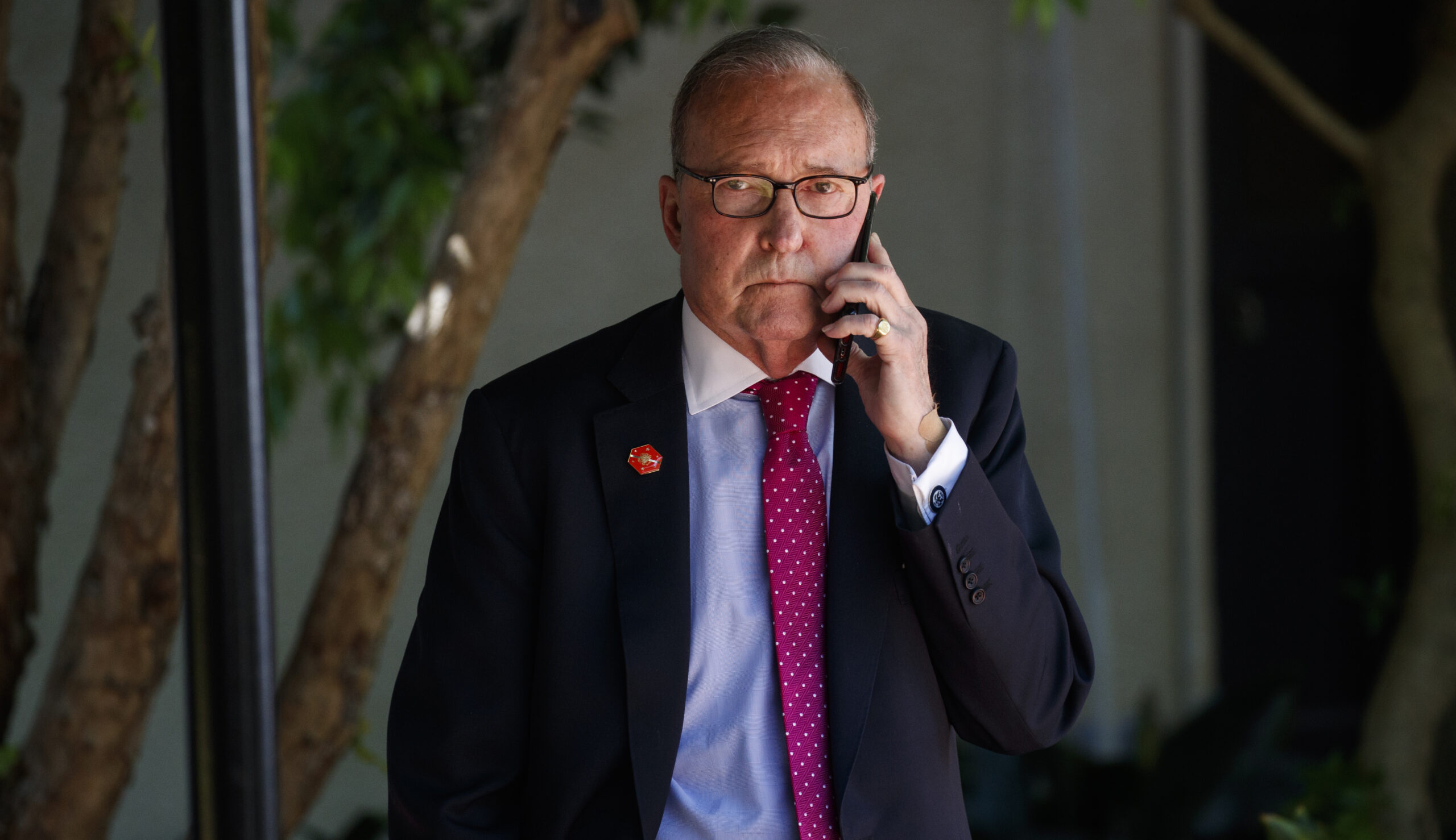 White House stands by Herman Cain ‘at the moment,’ Kudlow says