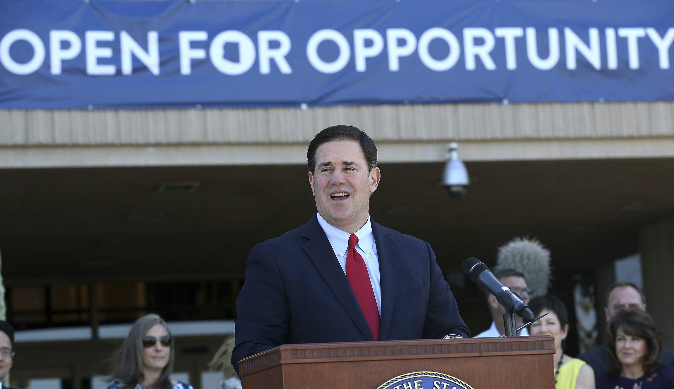 Border state governor criticized from all angles for supporting Trump’s tariff plan