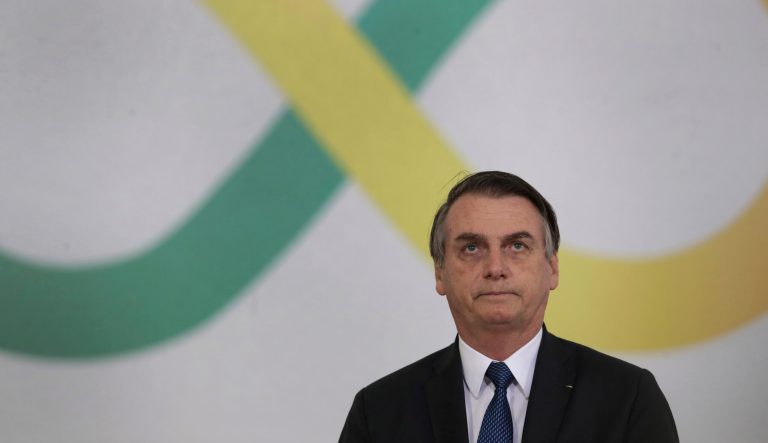 Brazil's President Jair Bolsonaro attends a ceremony marking his first 100 days in office, at the Planalto Presidential Palace, in Brasilia, Brazil, Thursday, April 11, 2019. 