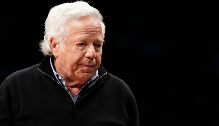 New England Patriots owner Robert Kraft leaves his seat during an NBA basketball game between the Brooklyn Nets and the Miami Heat, Wednesday, April 10, 2019, in New York.