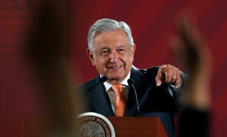 In this April 9, 2019 photo, Mexican President Andres Manuel Lopez Obrador answers questions from journalists at his daily 7 a.m. press conference at the National Palace in Mexico City.