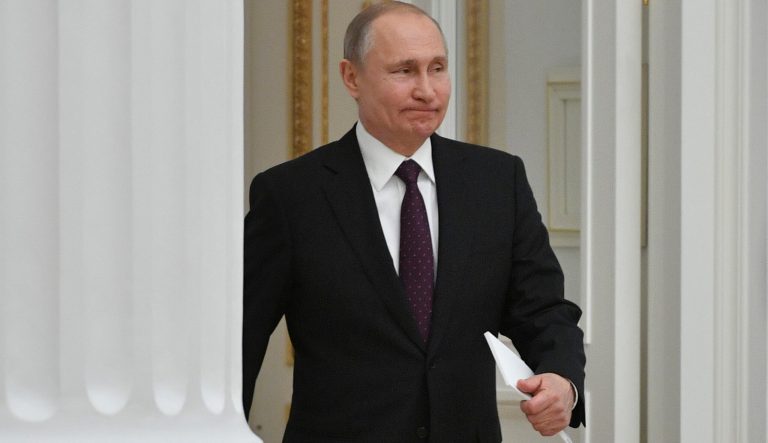 Russian President Vladimir Putin arrives to attend a meeting with French businessmen in the Kremlin in Moscow, Russia, Thursday, April 18, 2019. 