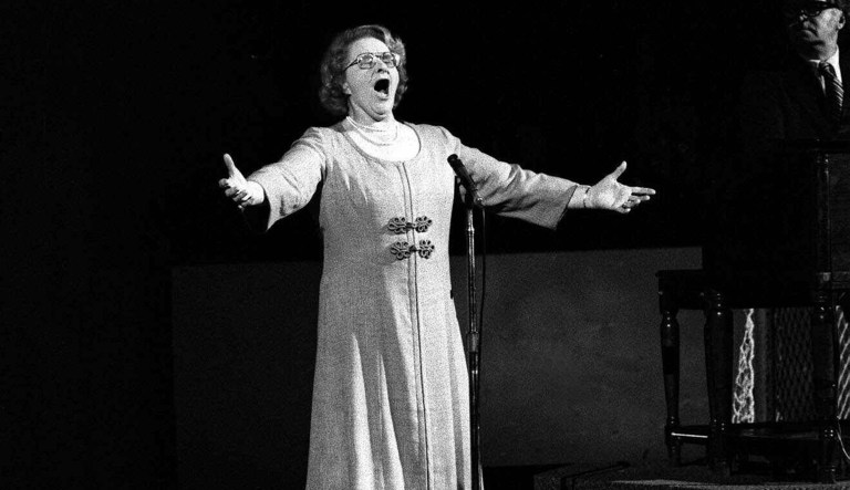 In this May 13, 1975, file photo, Kate Smith sings "God Bless America" before an NHL hockey Stanley Cup playoff game between the New York Islanders and the Philadelphia Flyers in Philadelphia.