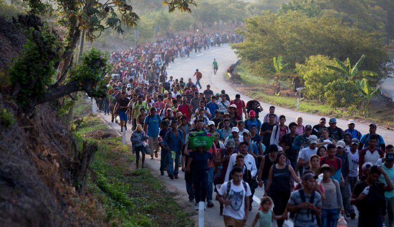 Central American migrants, part of a caravan hoping to reach the U.S. border, move on the road in Escuintla, Chiapas State, Mexico, Saturday, April 20, 2019. Thousands of migrants in several different caravans have been gathering in Chiapas in recent days and weeks.
