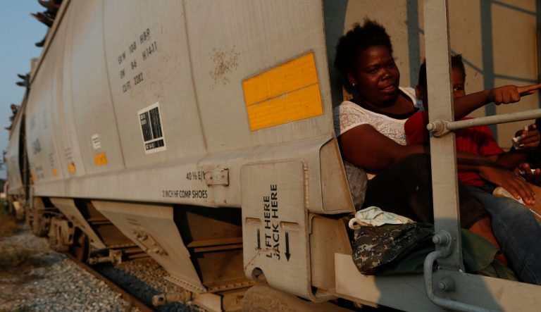 A woman and her son, from Roatan, Honduras, ride on a north-bound freight train on their way to the U.S.-Mexico border, in Ixtepec, Oaxaca state, Mexico, Tuesday, April 23, 2019. Many Central American migrants had waited weeks for Mexican visas that never came, and simply decided to head north without papers. 