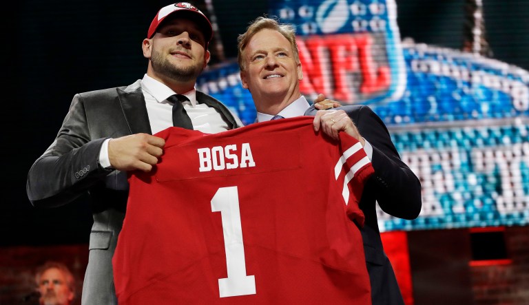 Ohio State defensive end Nick Bosa poses with NFL Commissioner Roger Goodell after the San Francisco 49ers selected Bosa in the first round at the NFL football draft, Thursday, April 25, 2019, in Nashville, Tenn.
