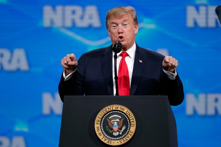 President Donald Trump speaks at the National Rifle Association Institute for Legislative Action Leadership Forum in Lucas Oil Stadium in Indianapolis, Friday, April 26, 2019. He could benefit in Virginia where Democrats are pushing gun control despite a pushback from gun supporters.