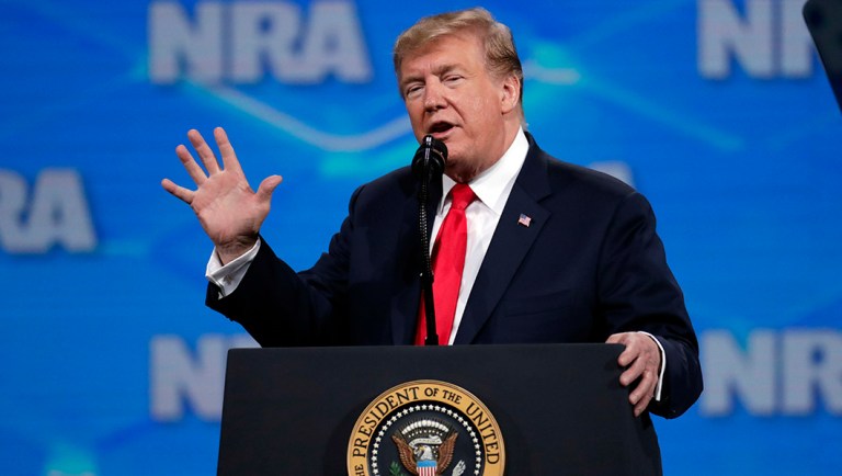 President Donald Trump speaks at the National Rifle Association Institute.