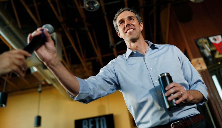 Democratic presidential candidate and former Texas congressman Beto O'Rourke is handed a microphone while speaking during a campaign stop Friday, April 26, 2019, in Henderson, Nev. 
