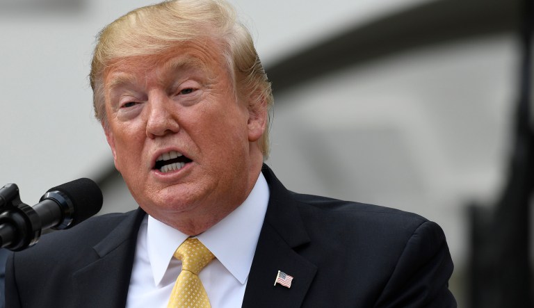 President Donald Trump speaks as he welcomes 2018 NASCAR Cup Series Champion Joey Logano to the South Lawn of the White House in Washington, Tuesday, April 30, 2019.