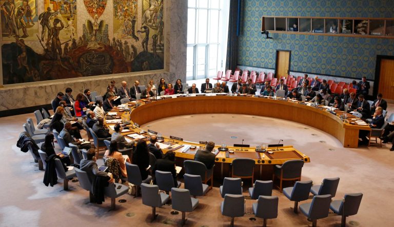 Members of the UN Security Council gather inside the United Nations Security Council chambers for a meeting on Tuesday, April 30, 2019. 
