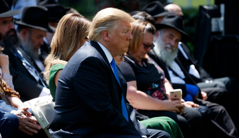 President Donald Trump prays during a National Day of Prayer event in the Rose Garden of the White House, Thursday, May 2, 2019, in Washington. 