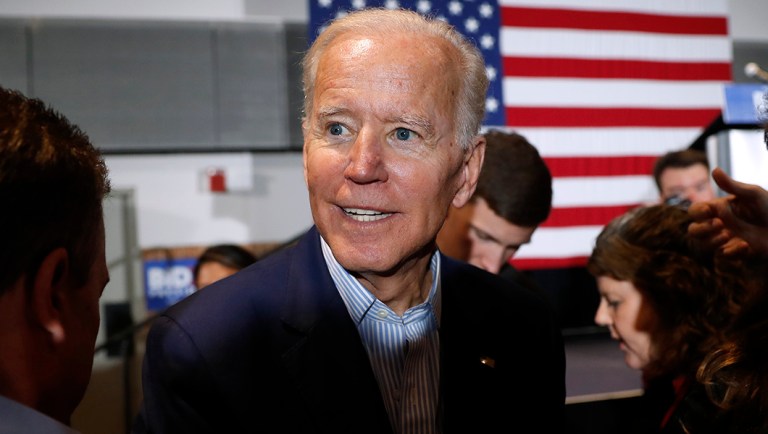 Former Vice President and Democratic presidential candidate Joe Biden greets audience members.