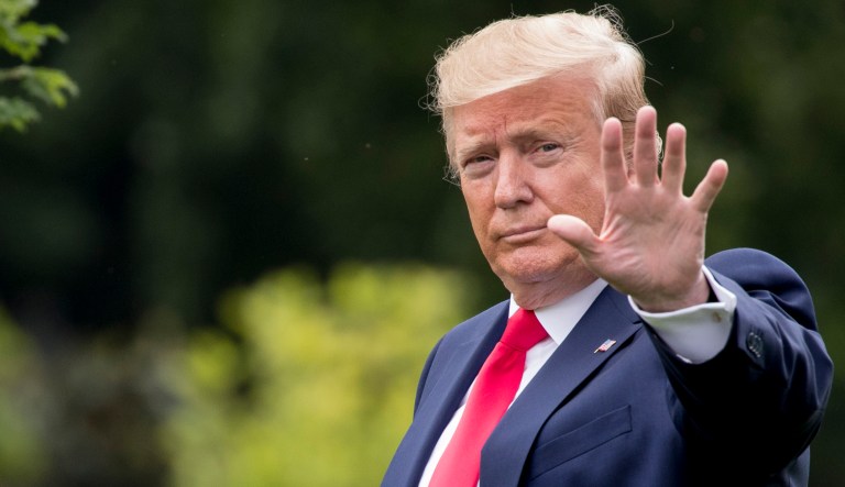 President Donald Trump waves to members of the media on the South Lawn of the White House in Washington, Wednesday, May 8, 2019.