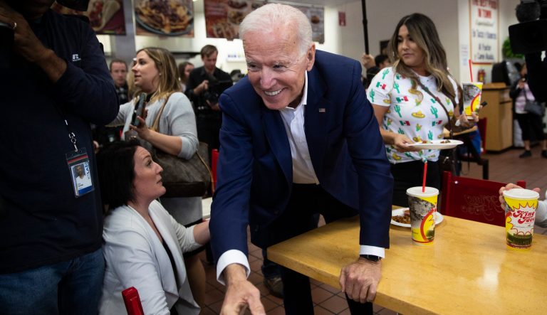Former vice president and Democratic presidential candidate Joe Biden shakes hands with a patron at King Taco Wednesday, May 8, 2019, in Los Angeles. 