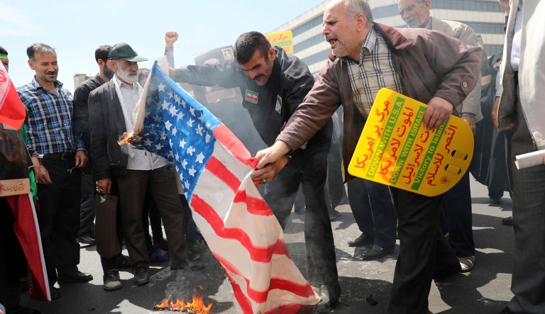 Iranian worshippers burn a representation of a U.S. flag during a rally after Friday prayer in Tehran, Iran, Friday, May 10, 2019. A top commander in Iran's powerful Revolutionary Guard said Friday that Tehran will not talk with the United States, an Iranian news agency reported â a day after President Donald Trump said he'd like Iranian leaders to "call me."