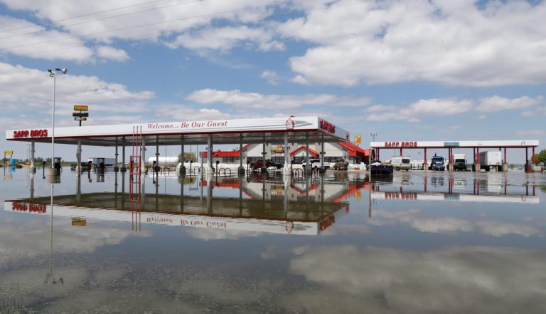 A Sapp Bros. gas station in Percival, Iowa, stands in floodwaters from the Missouri River, Friday, May 10, 2019. 