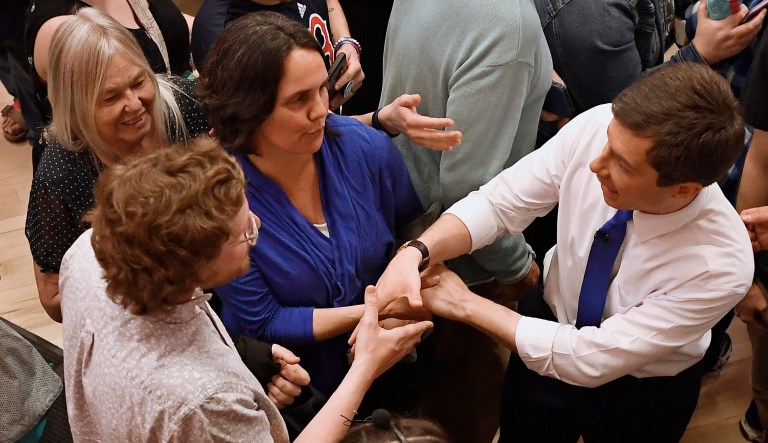 Democratic presidential candidate South Bend, Ind., Mayor Pete Buttigieg (pictured right) shakes hands with audience member after a FOX News Channel town hall in Claremont, N.H. 