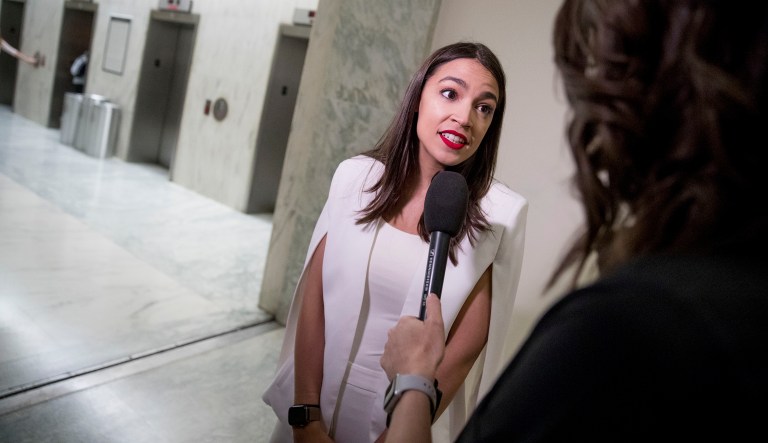 Rep. Alexandria Ocasio-Cortez, D-N.Y., speaks to a reporter on Capitol Hill in Washington, Tuesday, May 21, 2019.