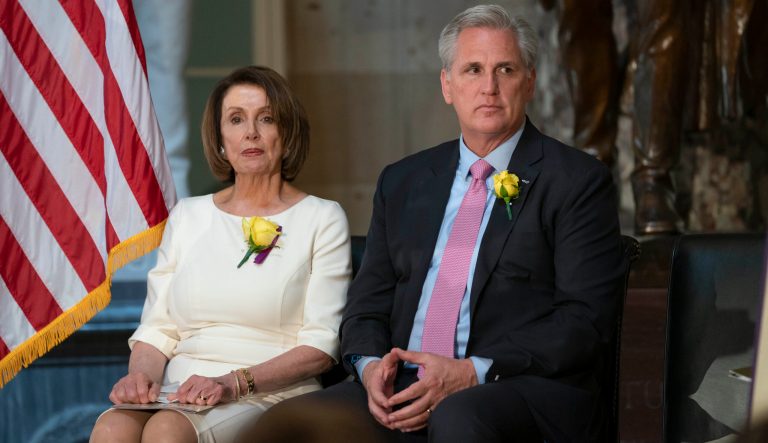 Speaker of the House Nancy Pelosi, D-Calif., and House Republican Leader Kevin McCarthy, D-Calif., right, sit together at an event at the Capitol in Washington, Tuesday, May 21, 2019. 