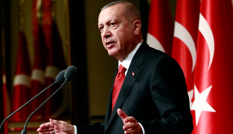 Turkey's President Recep Tayyip Erdogan gestures as he addresses a meeting in Ankara, Turkey, Thursday, May 30, 2019. Erdogan and U.S. President Donald Trump will meet at next month's Group of 20 summit to discuss bilateral issues, including Ankara's plan to buy a Russian missile defense system that has raised the ire of the United States.