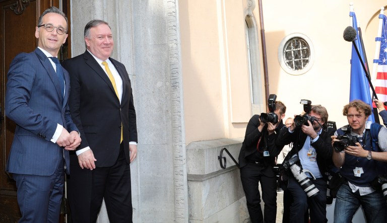 German Foreign Minister Heiko Maas, left, welcomes United States Secretary of State Mike Pompeo, second from left, at the foreign ministry's guest house Villa Borsig for talks in Berlin, Germany, Friday, May 31, 2019. Mike Pompeo is making his first visit to Germany as secretary of state at the start of a four-nation European trip as tensions rise between the U.S. and Iran.