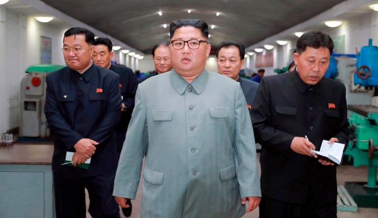 In this undated photo provided on Saturday, June 1, 2019, by the North Korean government, North Korean leader Kim Jong Un, center, visits the February 8 General Machine Factory in Chagang Province, North Korea.