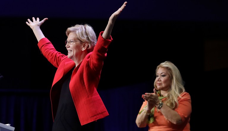 Democratic presidential candidate Sen. Elizabeth Warren, D-Mass., left, gestures after speaking during the 2019 California Democratic Party State Organizing Convention in San Francisco, Saturday, June 1, 2019.