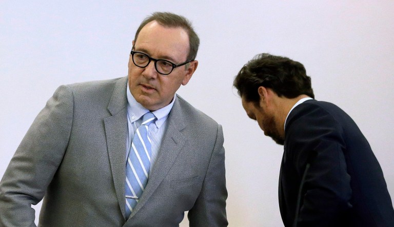 Actor Kevin Spacey arrives with his attorney Alan Jackson, right, for a pretrial hearing on Monday, June 3, 2019, at district court in Nantucket, Mass. The Oscar-winning actor is accused of groping the teenage son of a former Boston TV anchor in 2016 in the crowded bar at the Club Car in Nantucket. 