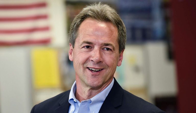 In this May 14, 2019, photo, Montana Gov. Steve Bullock, Democratic presidential candidate, officially announces his campaign for president at Helena High School in Helena, Mont. 