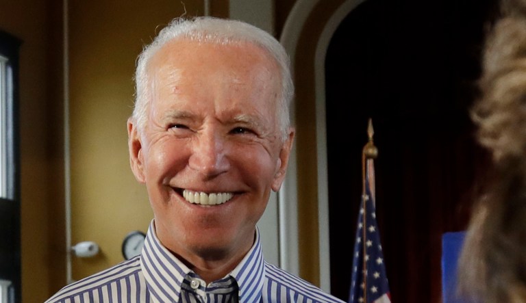 Former vice president and Democratic presidential candidate Joe Biden smiles at a campaign event.
