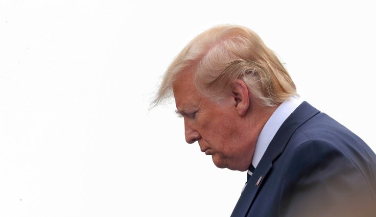U.S President Donald Trump looks on during commemorations for the 75th Anniversary of the D-Day landings at Southsea Common, Portsmouth, England, Wednesday, June 5, 2019. 