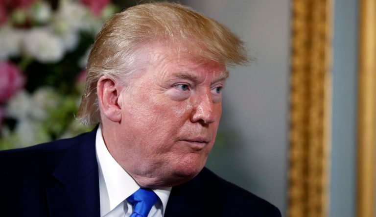 President Donald Trump meets with French President Emmanuel Macron in Caen, France, following a ceremony to commemorate the 75th anniversary of D-Day at The Normandy American Cemetery, Thursday, June 6, 2019, in Colleville-sur-Mer, Normandy, France.
