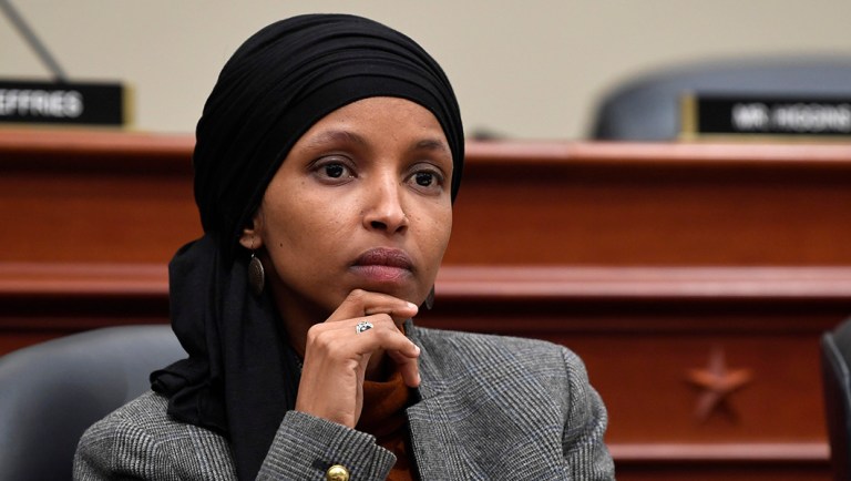 Rep. Ilhan Omar, D-Minn., listening.