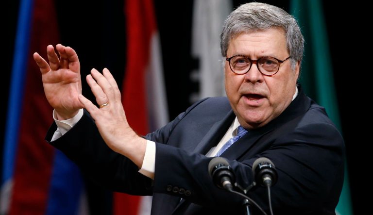 Attorney General William Barr, gestures as he speaks during a graduation ceremony for students of the Federal Bureau of Investigations National Academy at the FBI training facility in Quantico, Va., Friday, June 7, 2019. 