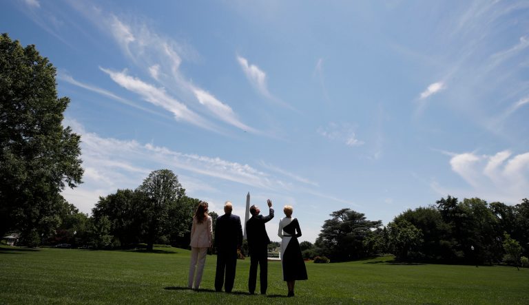 President Donald Trump, first lady Melania Trump, Polish President Andrzej Duda, and his wife Agata Kornhauser-Duda watch a flyover of one of two F-35 Joint Strike Fighter aircraft at the White House, Wednesday, June 12, 2019, in Washington. 