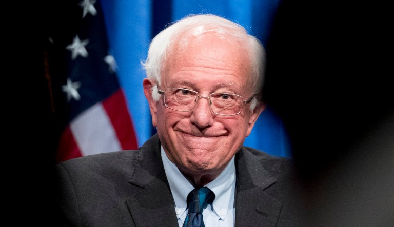 Democratic presidential candidate Sen. Bernie Sanders, I-Vermont, smiles while speaking at an event.
