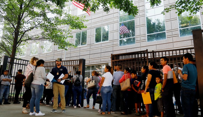 As US immigration agency and courts close, vast case backlog expands