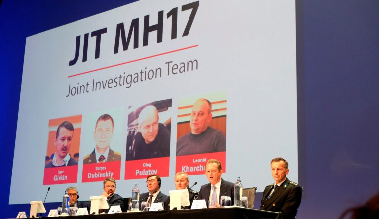 Officials from the Joint Investigation Team probing the downing of Malaysia Airlines Flight 17 in 2014 appear at a press conference in Nieuwegein, Netherlands, on Wednesday, June 19, 2019. 