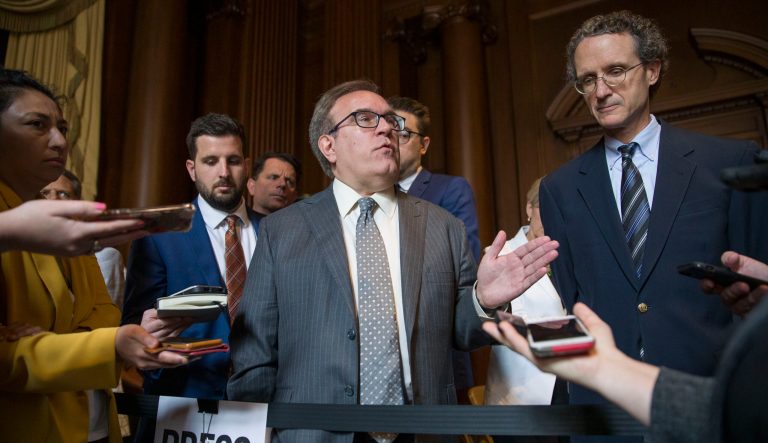 EPA administrator Andrew Wheeler speaks with the media at the Environmental Protection Agency, Wednesday, June 19, 2019, in Washington. Wheeler signed a repeal of one of the Obama era's two biggest climate change initiatives, the Clean Power Plan, and adopting an alternative plan that would loosen regulations on the plants. 