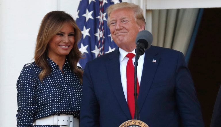 President Donald Trump, with first lady Melania Trump speaks from the Truman Balcony of the White House during the annual Congressional Picnic on the South Lawn, Friday June 21, 2019, in Washington. 