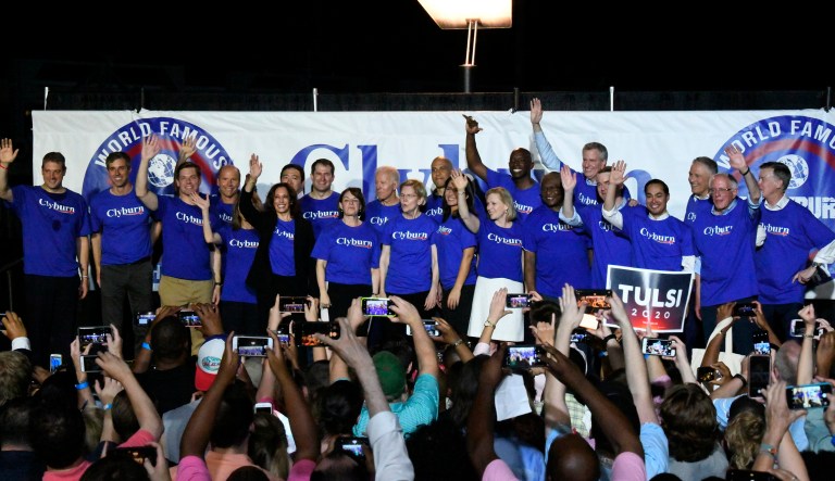 Twenty-one of the Democrats seeking the party's presidential nomination pose together after House Majority Whip Jim Clyburn's "World Famous Fish Fry," Friday, June 21, 2019, in Columbia, S.C. 