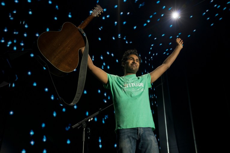 This image released by Universal Pictures shows Himesh Patel in a scene from "Yesterday."