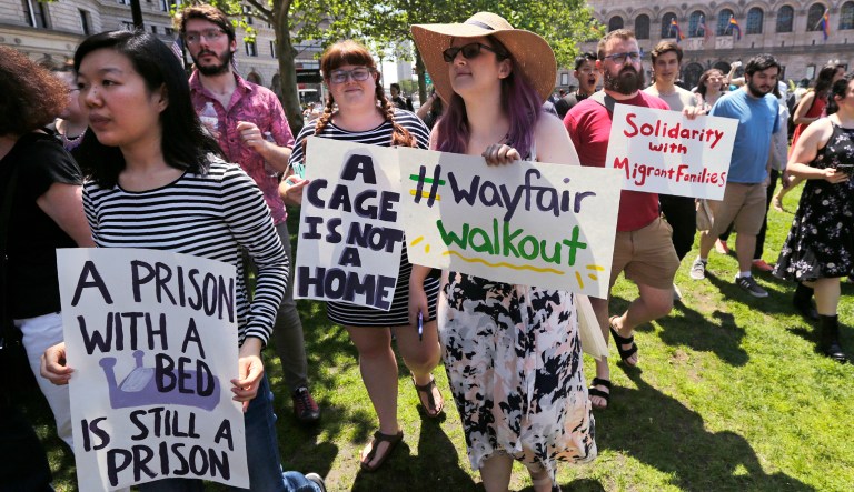 Employees of Wayfair march to Copley Square in protest prior to their rally in Boston, Wednesday, June 26, 2019. Employees at online home furnishings retailer Wayfair walked out of work to protest the company's decision to sell $200,000 worth of furniture to a government contractor that runs a detention center for migrant children in Texas.